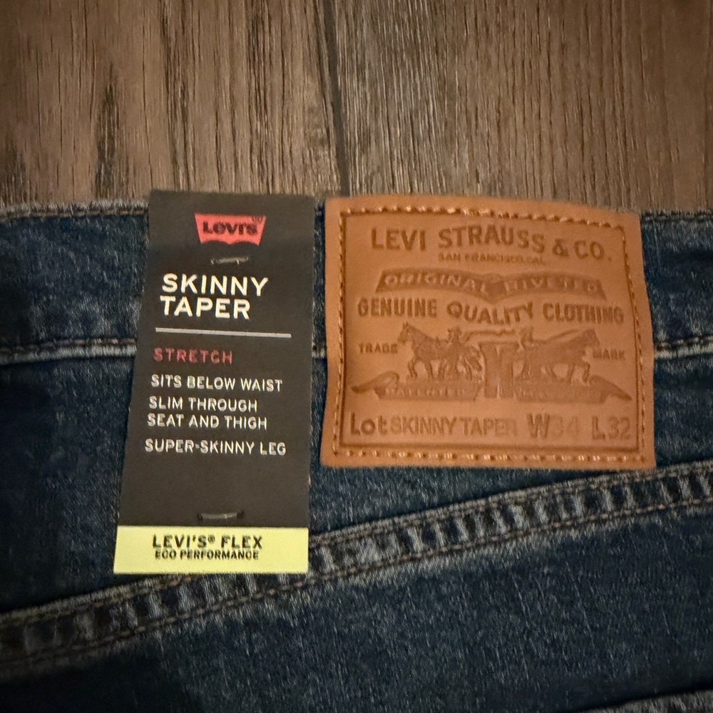 Brand New Mens Levi's Dark Blue Denim Skinny Taper Stretch 34/32.

1